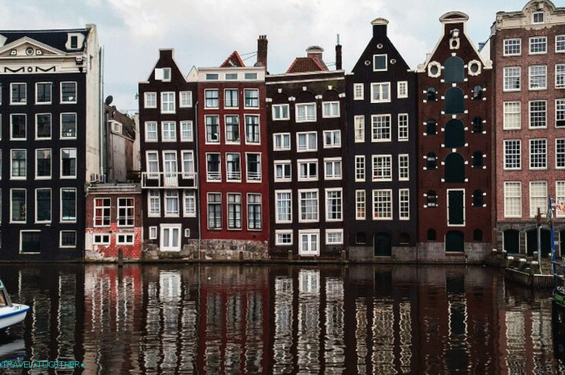 Charming Damrak, located in the direction of the way from the central station to Dam Square