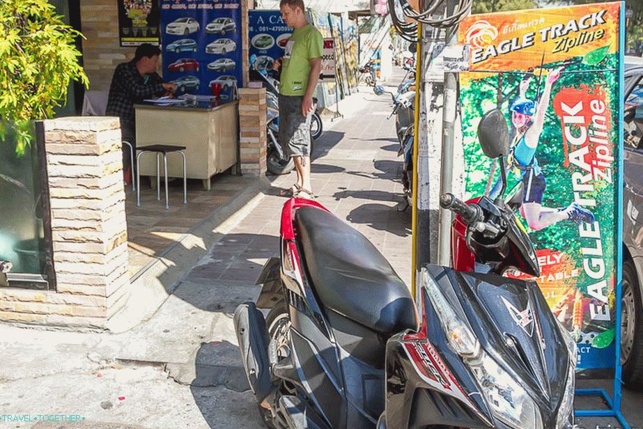 Pop Car Rental on the inside of the square