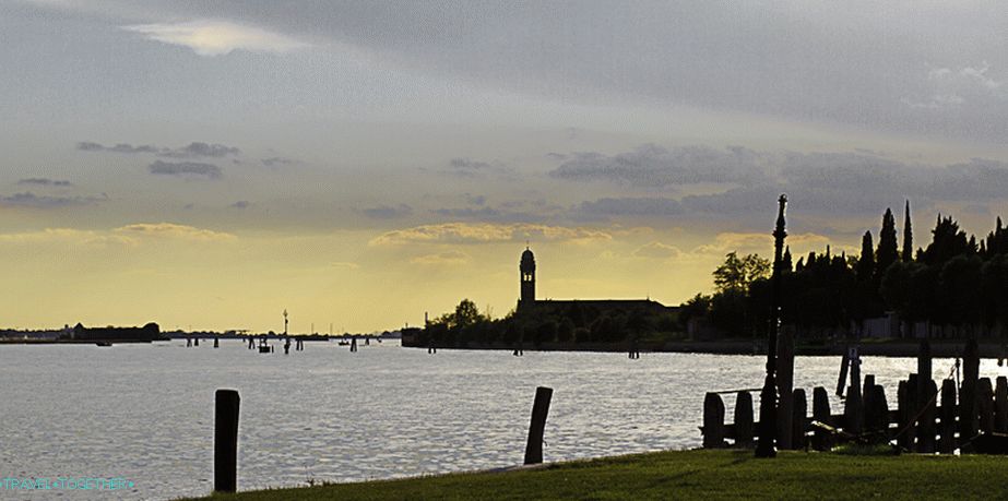 Sunset on Burano. Venice to the left in the distance.