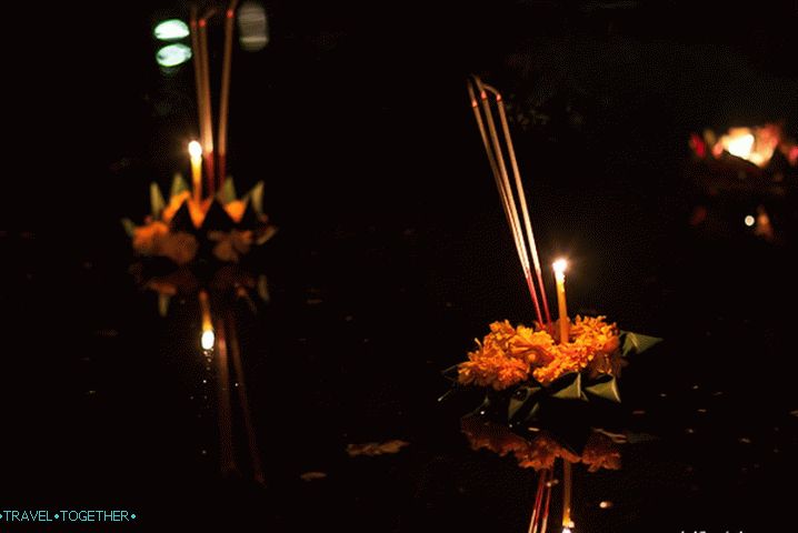 Krathong float on the water, taking away all the troubles away