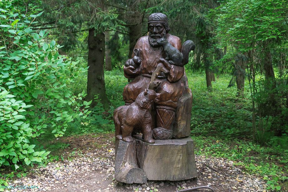 In the park with a dozen figures from fairy tales