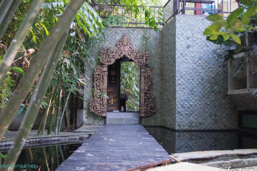 The bridge over the pond to the entrance to the mansion