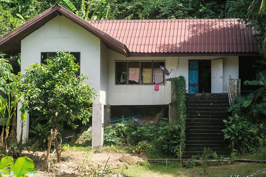Local staff live in simple houses