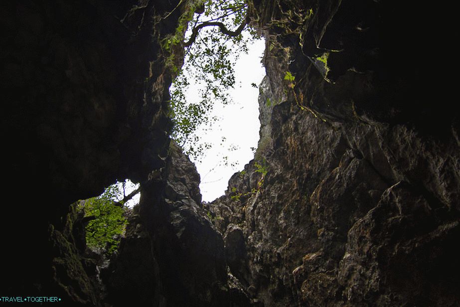 At the entrance through the cracks you can see the sky