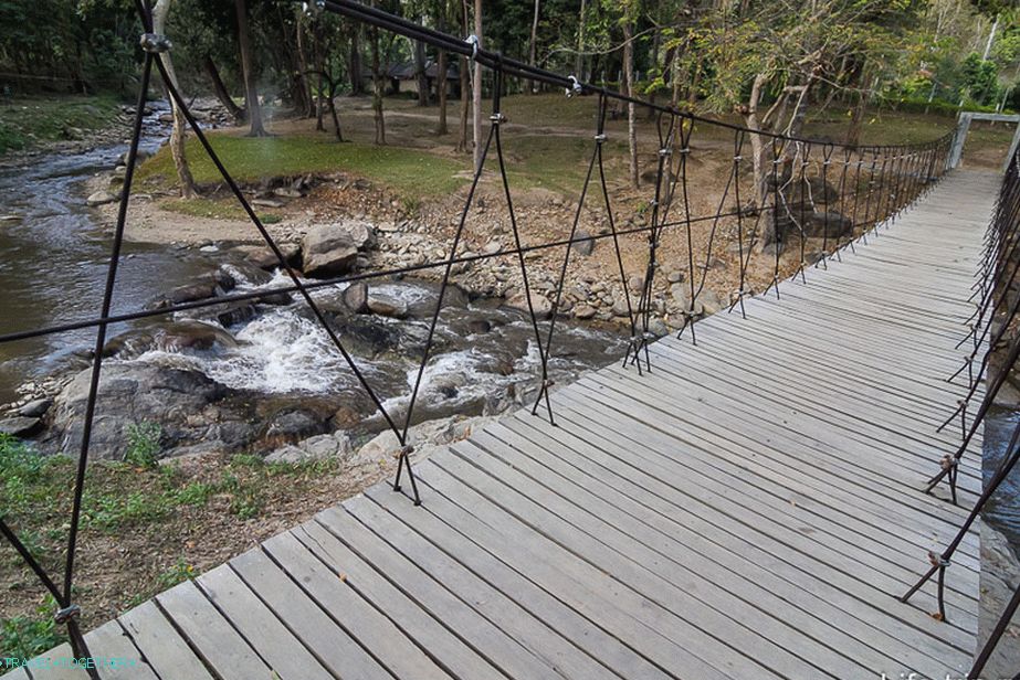 Stream - mountain river with a bridge