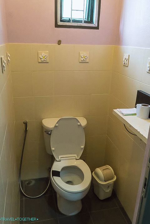 Toilet outside the door