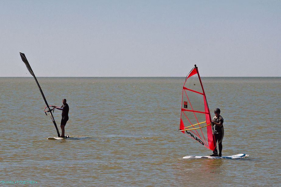 Surfers on Dolzhansky Spit