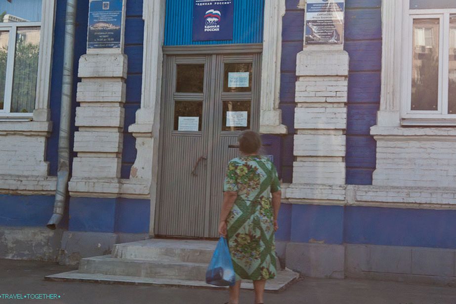 A woman in thought before a sign of the EDR