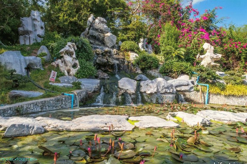 Artificial waterfall and lotuses