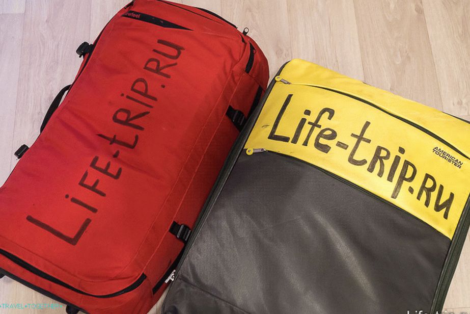 This time not to be confused signed the suitcases