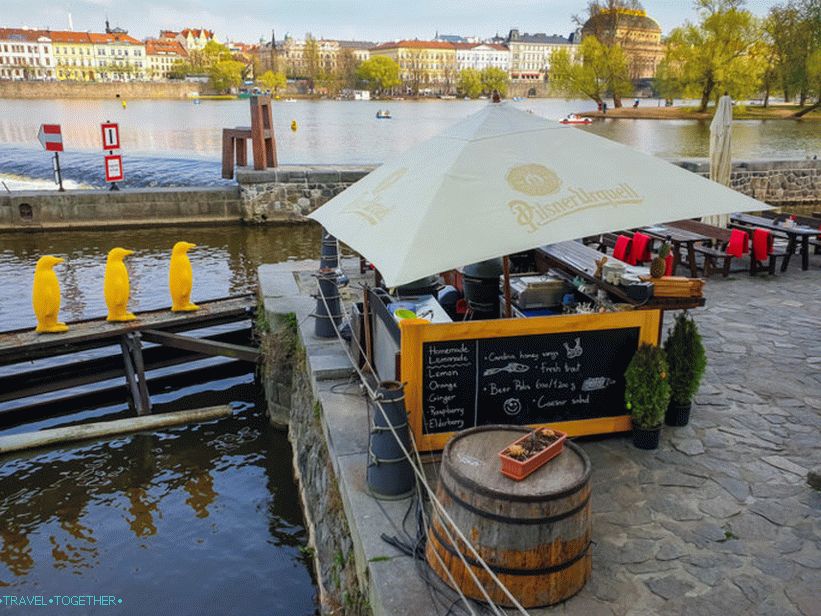 The march of the penguins through the Vltava - yellow penguins in Prague