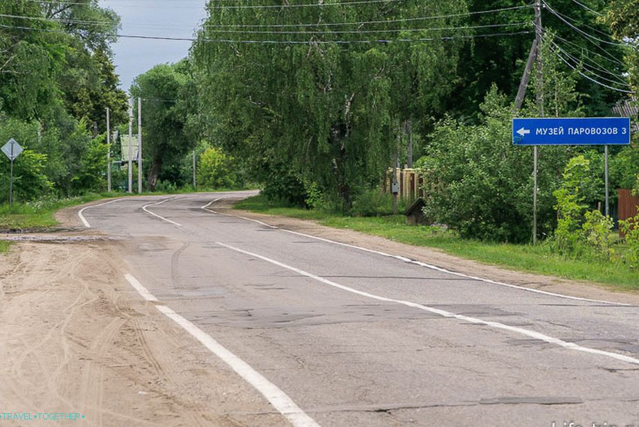 Turn onto a dirt road at the sign