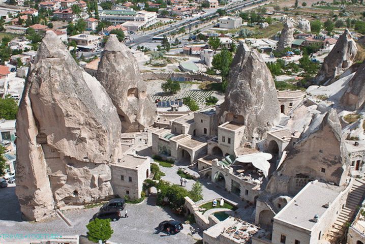 Goreme Village. Tuffs border modern houses.