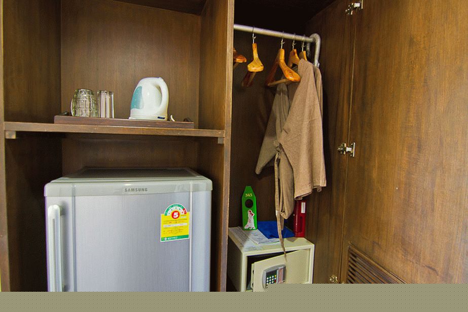Refrigerator, kettle and wardrobe with all sorts of things