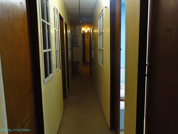 Narrow corridors and compartment doors to the rooms
