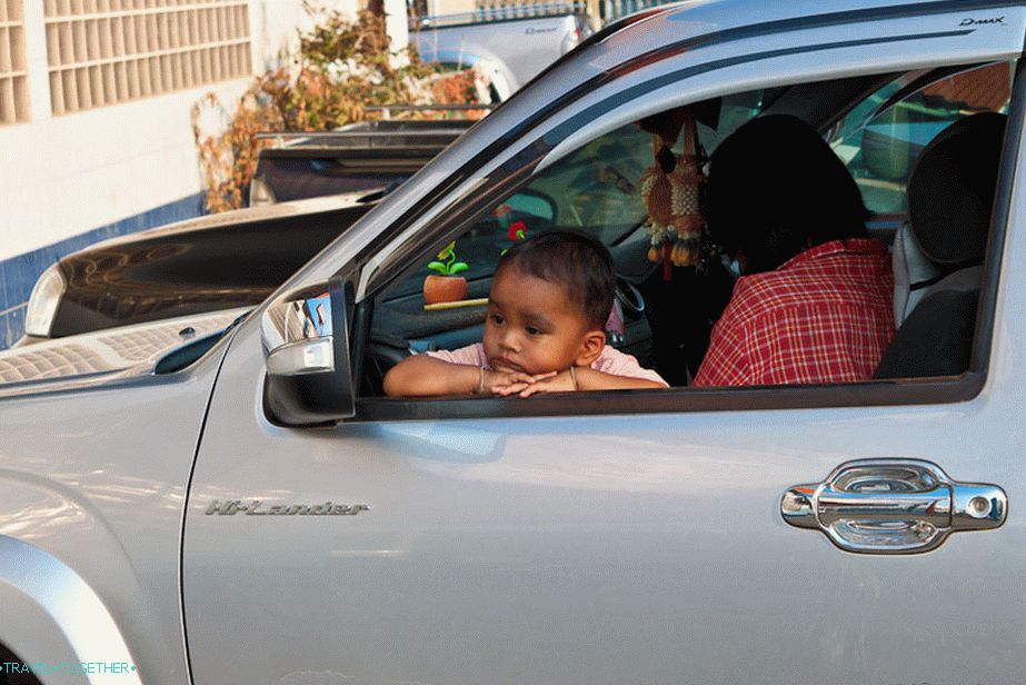 Sad child in the car
