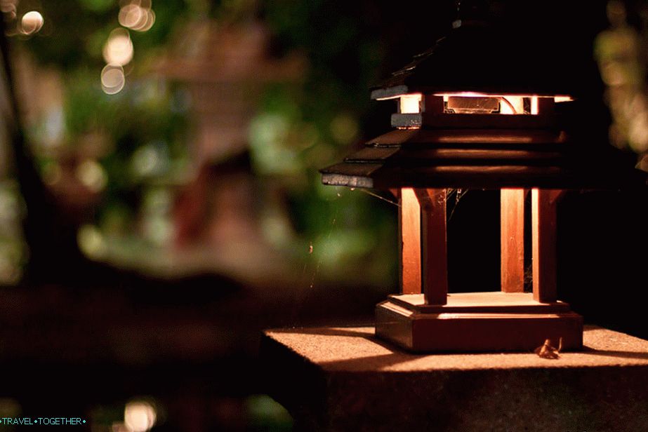 Cozy lamp on the fence