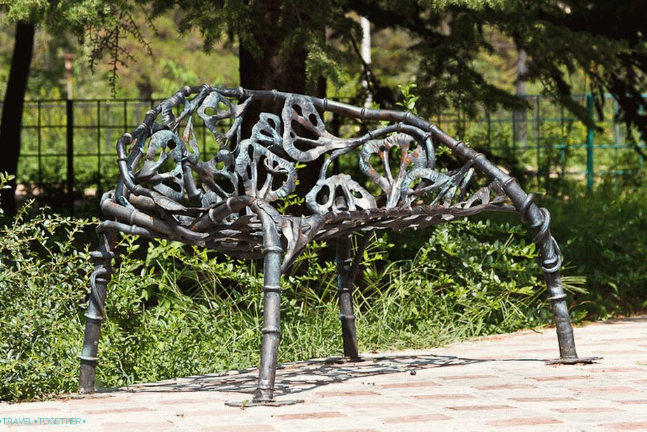 Openwork metal bench