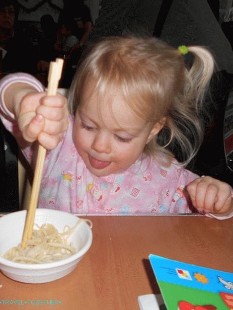 The first experience of using chopsticks (Hong Kong airport)