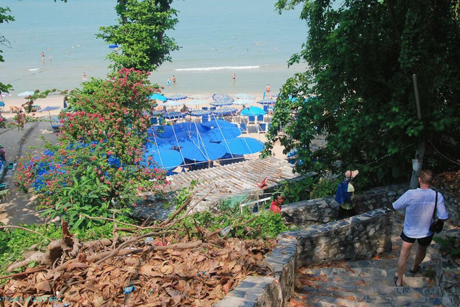 Descend the stairs to the beach
