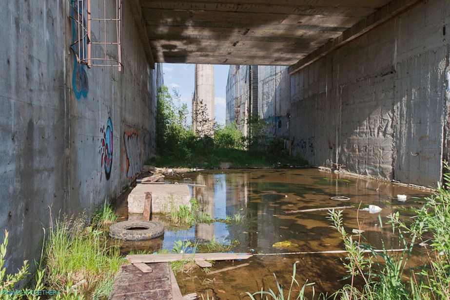 At the base of the dam