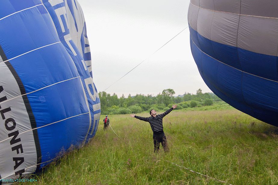 Everyone is photographed against the background of balloons