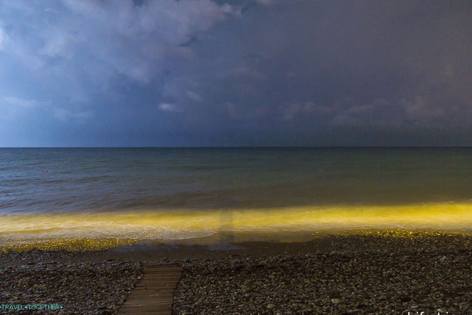 The night sea during a flash of lightning and my shadow
