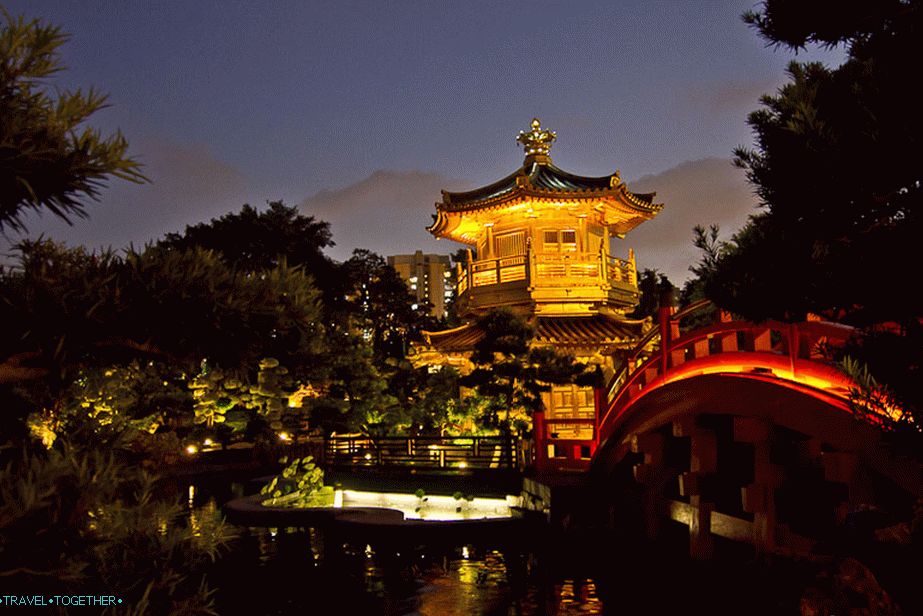 Elegant Chinese arbor in the middle of a lotus pond