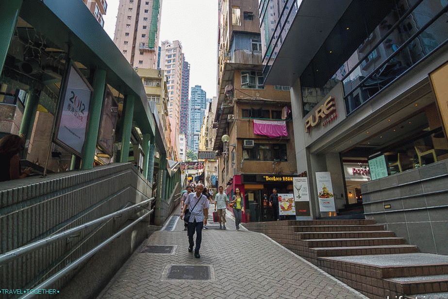 Parallel to the escalator is a street in the form of a staircase