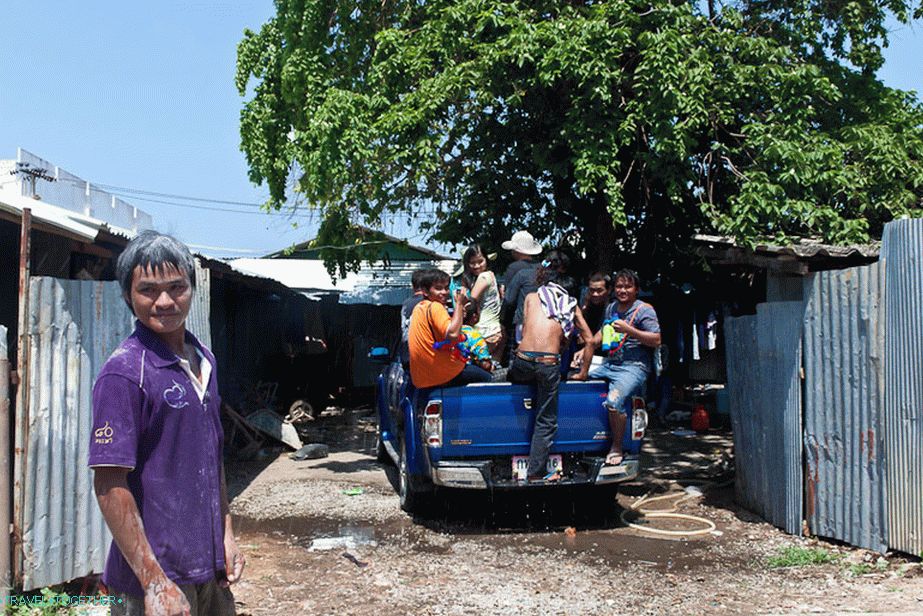 Neighbors gather for a fight called Songkran