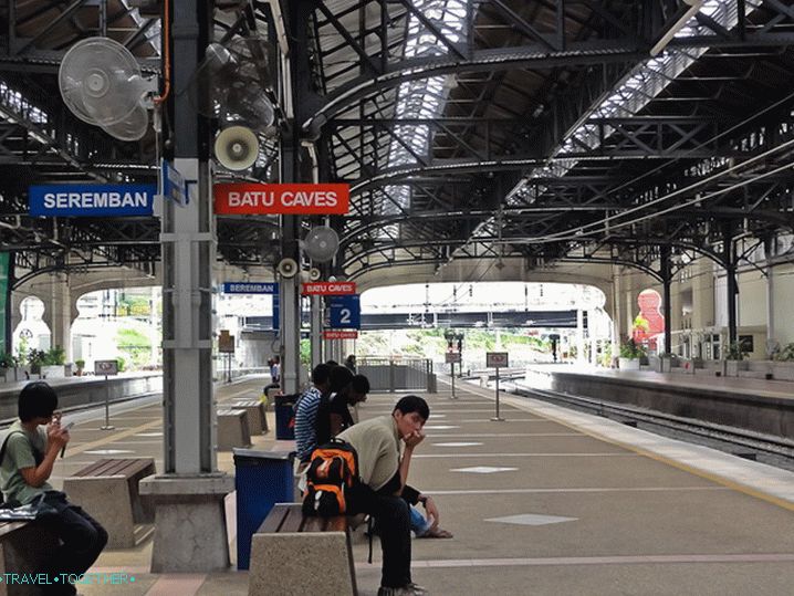 Platform at KTM Komuter station with direction signs