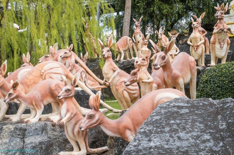 The garden is decorated with thousands of concrete painted figures of various animals