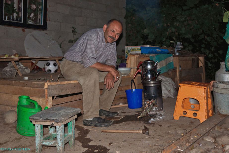 The father of the family likes to drink tea from a special Turkish samovar
