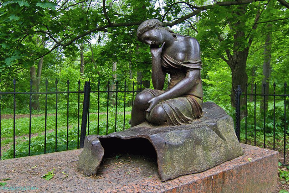 A girl with a jug, but the jug was sawed off with the fingers