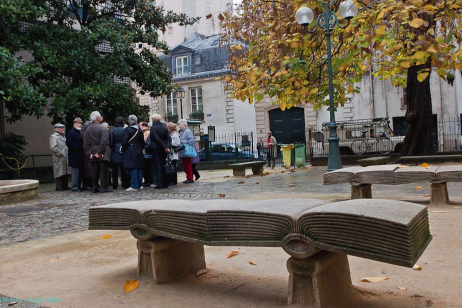Bench in the form of an open book