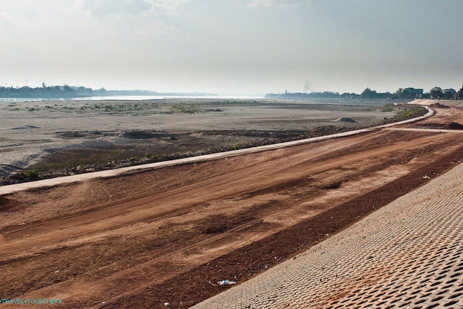 In the distance, the sacred and shallowed Mekong