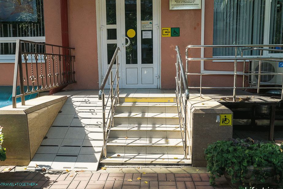 Here at least there is a bell and a ramp by which you can drive a pram