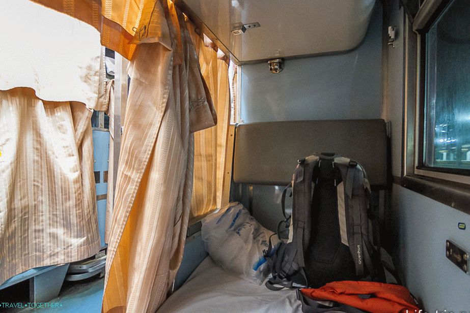 I lie on the bottom shelf, wide and comfortable